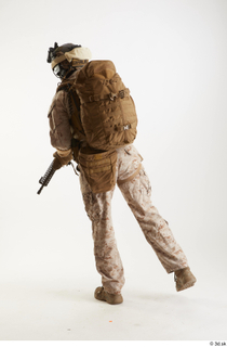 Casey Schneider Paratrooper in Desert Marpat with Gun standing walking…